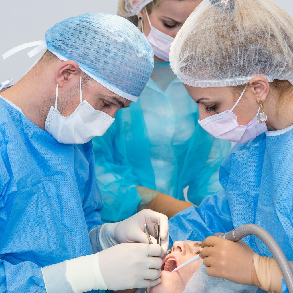 placing dental implant