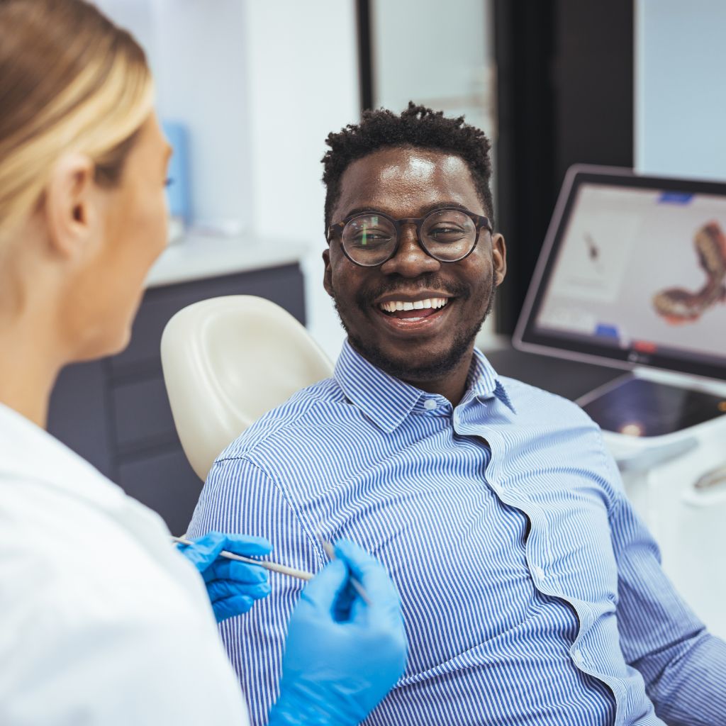 Periodontist in Seattle, WA smiling restorative dentistry patient