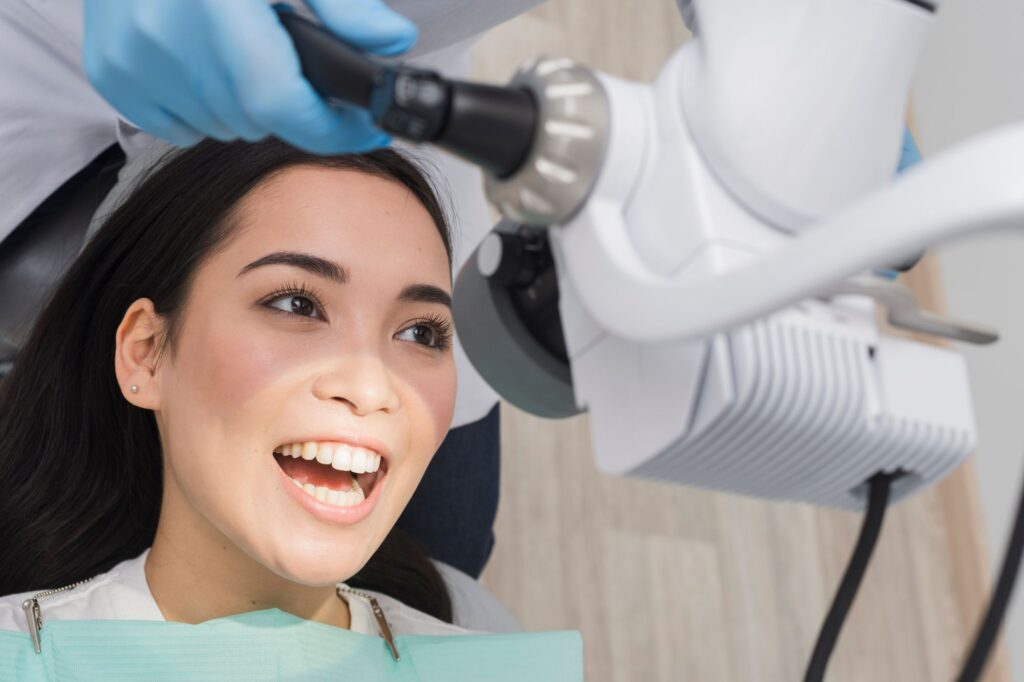 smiling patient after gum disease treatment