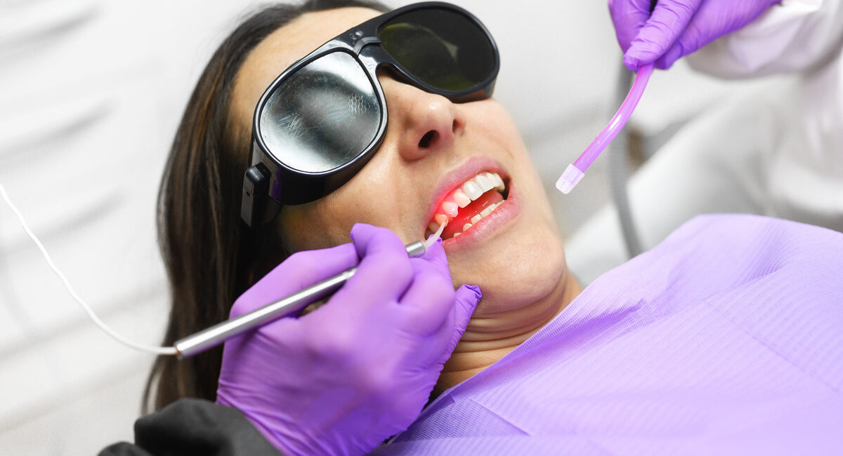 Dentist Using A Modern Diode Dental Laser