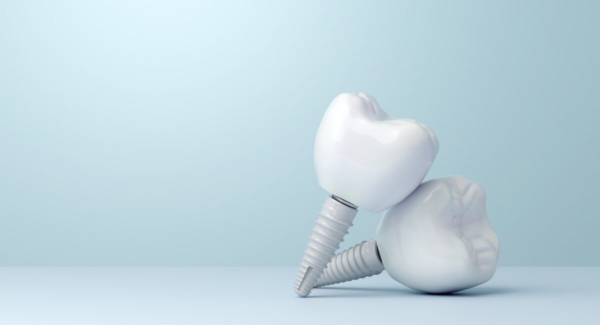 Zirconia dental implant with copy space on blue background. 3D rendering