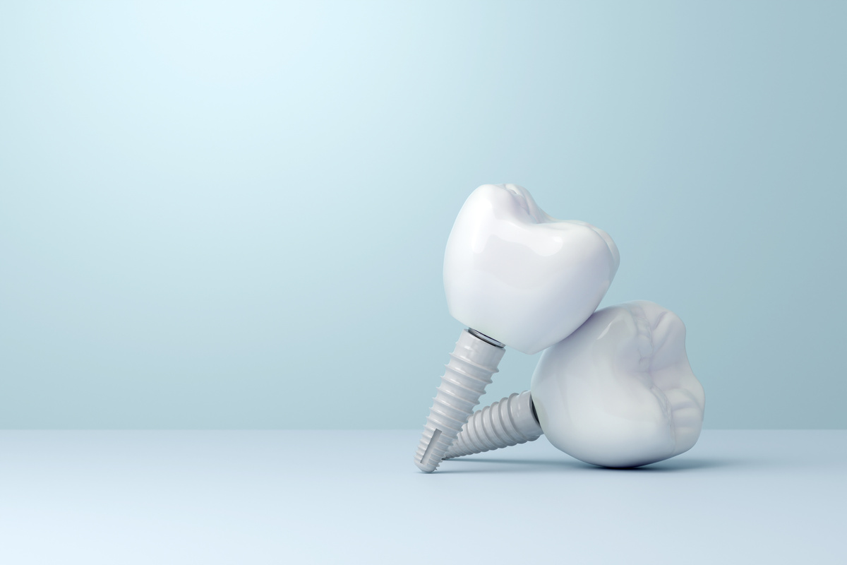 Zirconia dental implant with copy space on blue background. 3D rendering